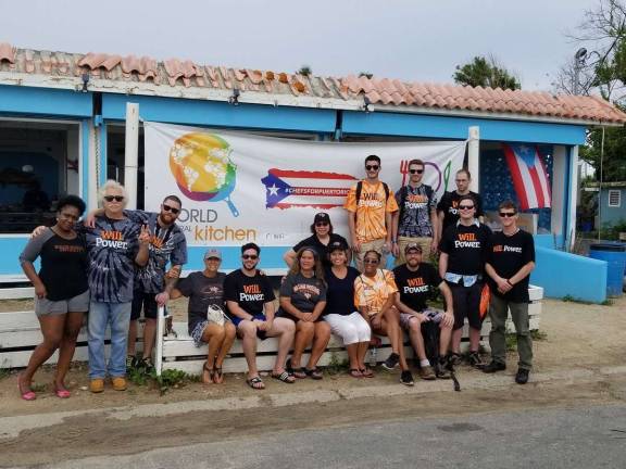 Traveling to Vieques after Hurricane Maria The Vieques Team. From Left: Student Aziza McGill-Ayinde, Radio Vieques General Manager Robert Rabin, student Jacob Martinez, Vieques Resident Margo Cheney, Brave New Radio General Manager Sebastian Escobar, Vieques resident Eva, Professors Diana Peck and Lori Ramos, (Front) student Shaney Lara, Faculty member Dante Portella, Myself, student Matthew Mullins, (rear) students Nicholas Gomez, Thomas Smith, and Richard Potenza. Behind the camera is student Michele Shepard Ciz.