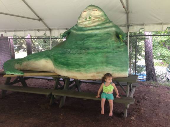 Bella Pagnotta guards Jabba the Hutt during LMP Star Wars Day Celebration