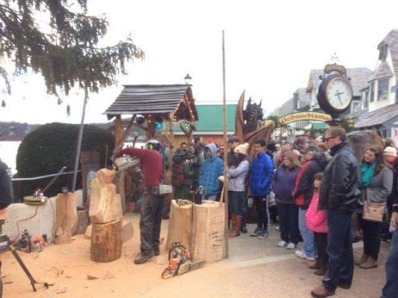 A power-saw woodcarver impresses onlookers at last year's event