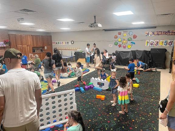 Sparta. Summer Reading Program begins Children play games during the kickoff of the Sparta Public Library’s Summer Reading Program on Monday, June 23. (Photo by Dave Costa)