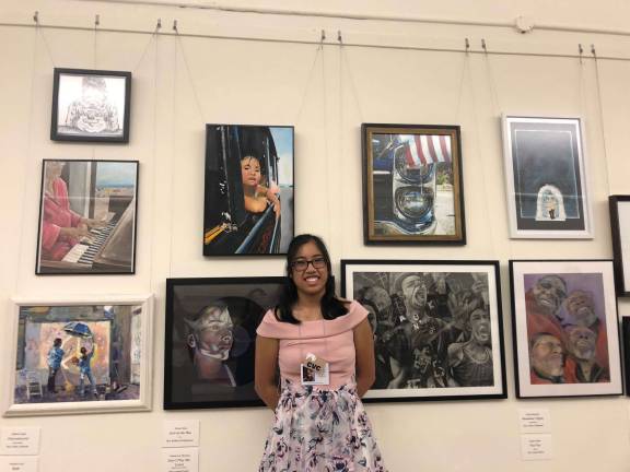 Pope John grad has painting hung in US Capitol Talon before the wall in the Cannon Tunnel where "Girl on a bus" hangs