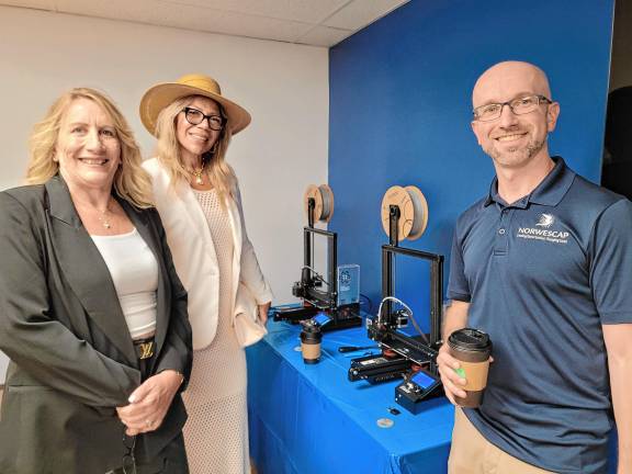 Center for Entrepreneurship opens <b>From left are Colleen Keever, Lana Molina and Sean Hyland in the new Center for Entrepreneurship</b>.