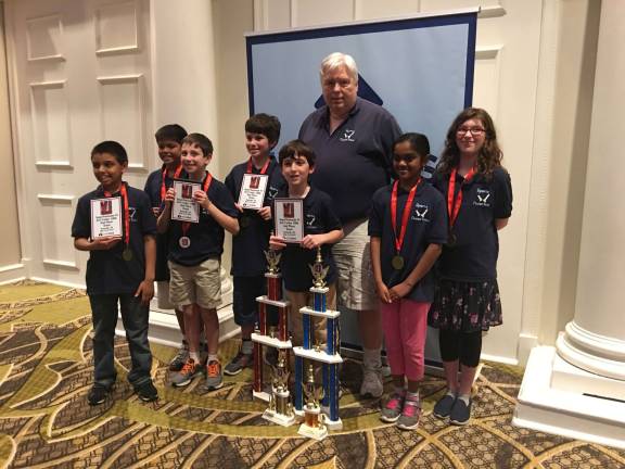 Sparta students are more than pawns at chess tourney The Helen Morgan School Chess Team: fron left, Ayush Iyer, J C Langeraap, Ian Bellush, Rowan Mendel, Griffin Brawer, Coach Tom Murray, Surekha Selvaraj and Chloe Brawer Photos courtesy of the Sparta Chess Club