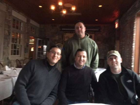 Four members of Team West Milford at the Mohawk House, seated from left; West Milford P.O. Rob Kulawiak, Sparta Police Sgt. Rob Fraser, Jefferson Township P.O. Dan Florio; standing, West Milford P.O. Anthony Frassa