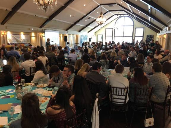 Pass It Along honors its volunteers The reception hall at the Lake Mohawk Country Club was packed and buzzing for the Pass it Along recognition celebration Photos by Amy Shewchuk