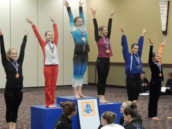 Garden Gators earns high marks at memorial meet Morgyn Witt of Newton, 5th place for Balance Beam for the Gold level.