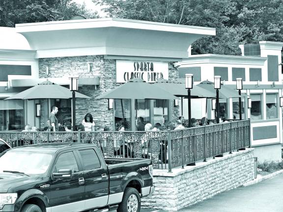 Sparta Diner to mark one year anniversary Photos by John Church The patio was crowded on Father's Day.