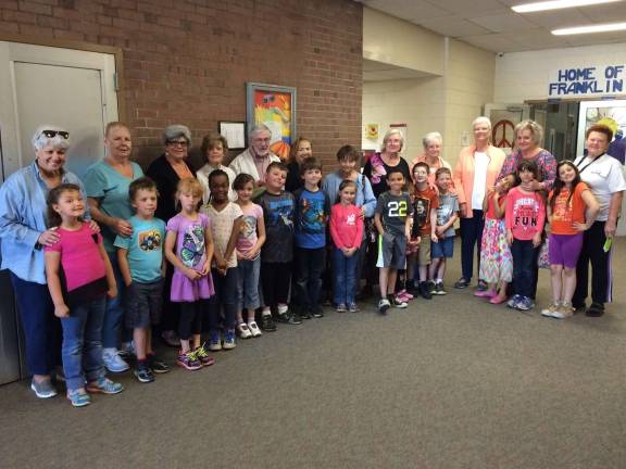 Seniors visit school kids for ice cream Seniors from Knoll Heights Village and their pen pals at Franklin Elementary School.