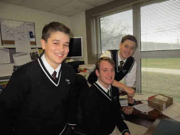 Pope John scouts honored From left, Eagle Scouts Brendan Karolchyk, Kyle Frey, and Zach Kessler.