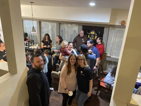 Kaitlin Gagnon, right, poses with campaign manager Dana Gulino at a party to watch the election returns Tuesday, Nov. 7 in Sparta. (Photo by Deirdre Mastandrea)