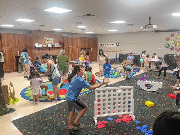 Sparta. Summer Reading Program begins SPL1 Children play games during the kickoff of the Sparta Public Library’s Summer Reading Program on Monday, June 23. (Photo by Dave Costa)