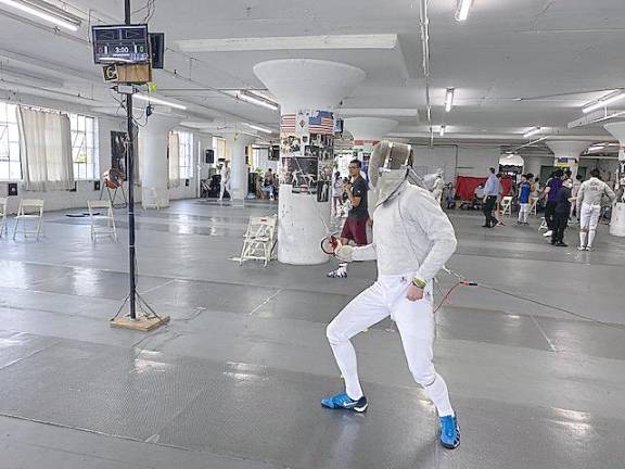 Pope John student wins silver fencing medal Allen Trudnos