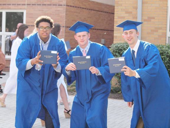 Pope John XXIII High School commencement Graduates Dalyn Wade-Perry, Matthew Dengler and Brian Dolan get dramatic