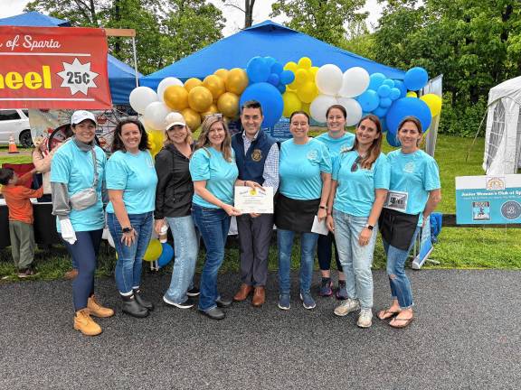 Township celebration marks 50th year State Assemblyman Michael Inganamort, R-24, presents a citation congratulating the Junior Woman’s Club of Sparta on the 50th annual Sparta Day. (Photo provided)