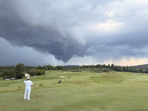 Golfer struck by lightning LG1 Ominous skies over Ballyowen Golf Club in Hamburg on Tuesday, July 8 moments before lightning strikes a golfer. (Photos by Brian Delia)