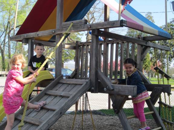 Preschool gets donation for playground Abbey Pierson, Mason Lindsay and Amelia Daly on the Blessed Beginnings playground, which is scheduled for upgrade and replacement.