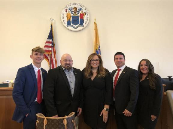 From left are Sussex County Commissioners Jack DeGroot, Bill Hayden, Jill Space, Chris Carney and Dawn Fantasia. DeGroot was sworn in Monday, Jan. 1. Fantasia will leave the board Tuesday, Jan. 9 to become a member of the state Assembly. (Photo by Kathy Shwiff)