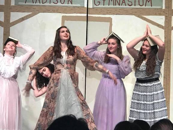 Veritas to hold open house on Feb. 3 Veritas students perform in the school's spring musical.