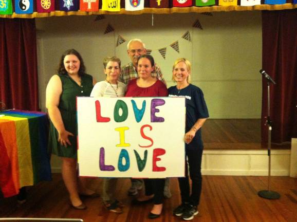 Local gays speak out against discrimination From left, Heath, Penna, Sauer, Jamie Bruesehoff, and Assembly candidate Kate Matteson.