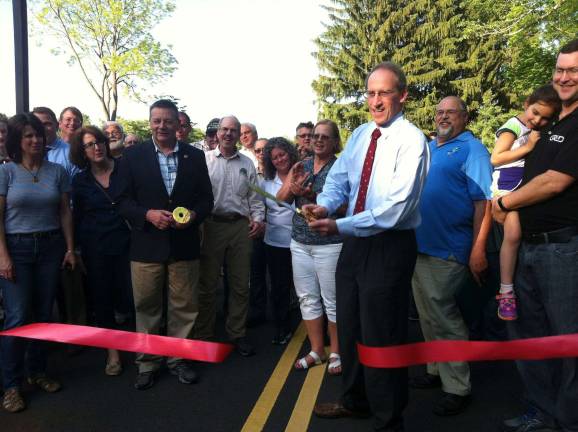 Tamarack Park opens Ray Bonkewr cuts the ceremonial ribbon