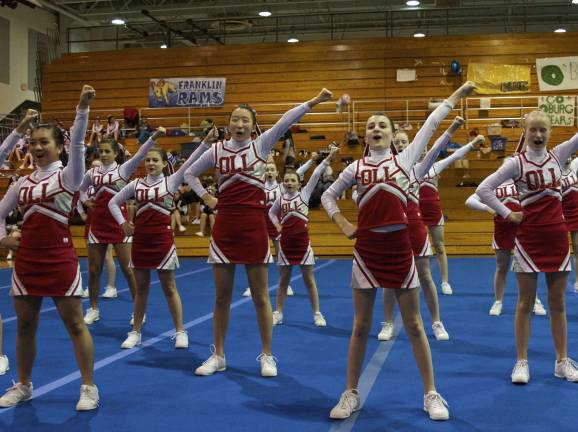 Rah, rah, rah Our Lady of the Lake Varsity Cheer Team earns a first degree award in the Grammar School Cheer Division Competition.