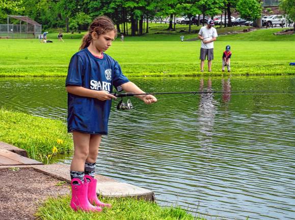 Photos: Annual Trout Derby in Sparta Estelle Szymanski lets out line.