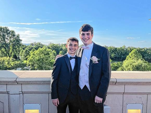 Salutatorian is outstanding cellist Valedictorian Tyler Harms, left, and salutatorian Rowan Mendel.