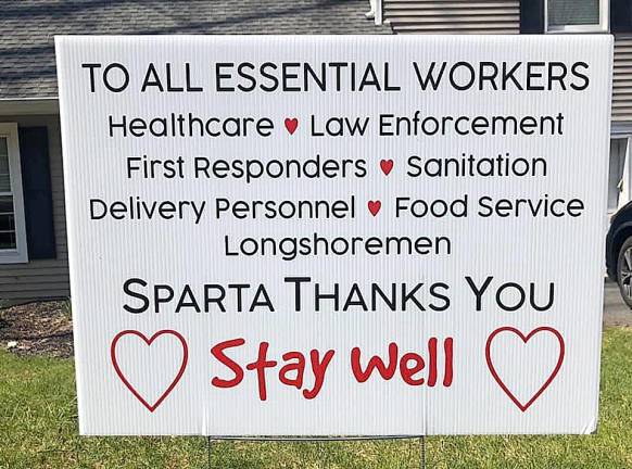 Lawn signs bought as donations by followers of Sparta Helps Healthcare Heroes