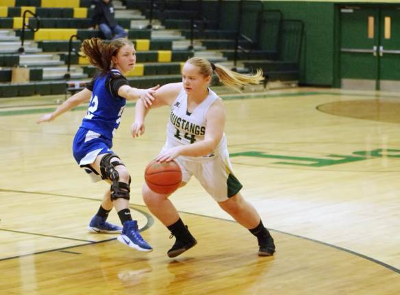 Sussex Tech's Mikaela Hall dribbles the ball past Wallington's Nicole Konefal in the fourth quarter. Hall scored 2 points.