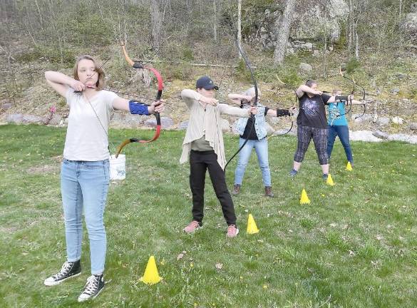 Wildish Way helps empower women through archery and animals Attendees of Meghan Hindi’s archery class.