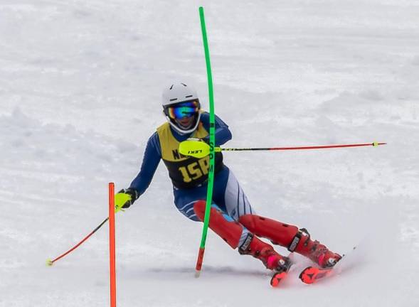 Kanna Pasunuri, captain of the varsity boys team, competes in the second slalom race of the season Jan. 29 at Winter4Kids. He placed third with a combined time of 1:31.39. (Photos by Paul Lopez)