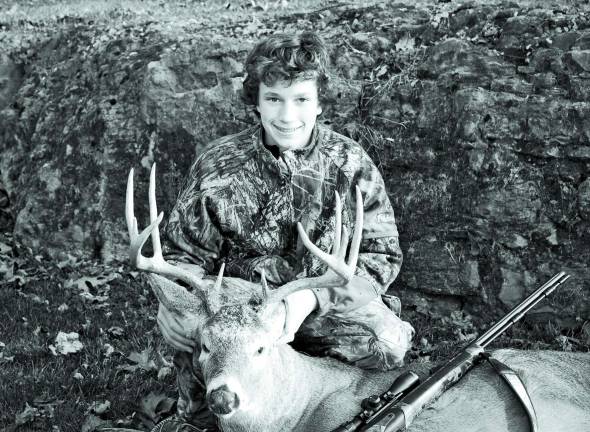 Young sportsman turns business owner at 18 Garrett Kazar with a 10-point buck he shot.