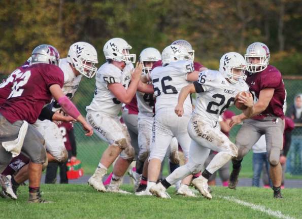 Wallkill Valley ball carrier Ben Mizeski is on the run in the second half.