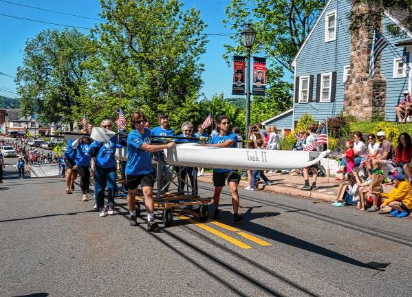 Photos: Memorial Day Parade Rowing Club members with one of their boats.