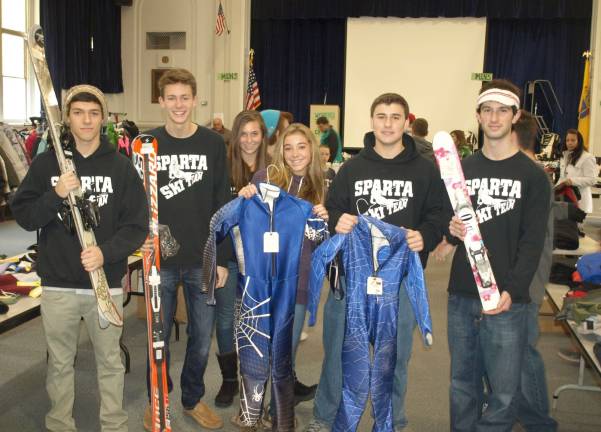 Ski swap helps team, sellers and buyers Sparta High School Ski Racing Team members display the variety of equipment for sale at the ski swap in the Mohawk Avenue School Saturday morning.