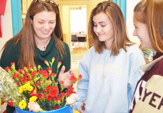 Jenny Allen, left, with her students.