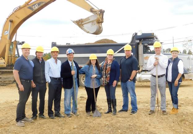 (L-R) Developers Owen Dykstra, Mark Konarsky, and Dimitris Prassas, restauranteurs Steve and Rachael Scro; Sparta Mayor Molly Whilesmith, Freeholder Joshua Hertzberg, Sparta Police Chief Neil Spidaletto and Sparta Councilwoman Christine Quinn gather as the Scros, who own the Mohawk House, break ground at the site of their new restaurant, Modern Farmer, on Tuesday, Sept. 24, 2019.