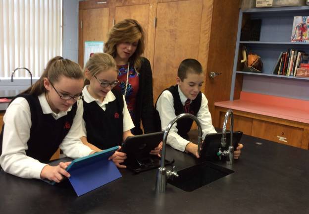 Second career success Susan Santore, principal at The Reverend Brown School, is dedicated to infusing technology into the curriculum and developing the leaders of tomorrow.