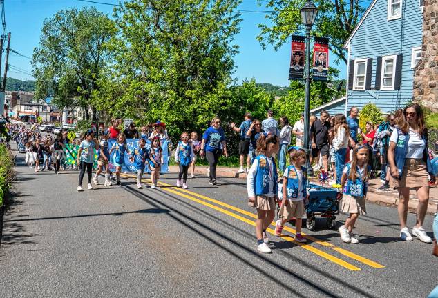 Photos: Memorial Day Parade Girl Scout members march in the parade.
