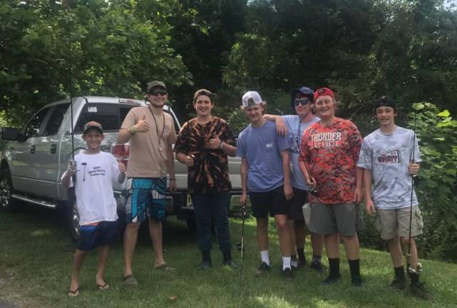 Andover Hunt &amp; Fish's camp participants prepare to fish at the Paulinskill River.