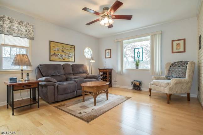 Bright and airy ranch features natural light, hardwood floors Bright and airy ranch features natural light, hardwood floors