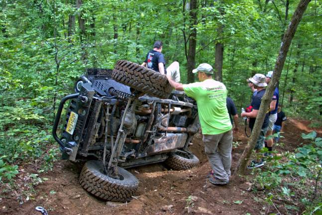 Surprisingly, no one was injured during this flip and the jeep only had a small plastic piece cracked