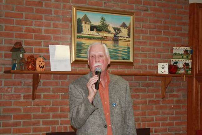 Library holds wine tasting Brian Doherty, President of Sparta Library Board of Trustees.
