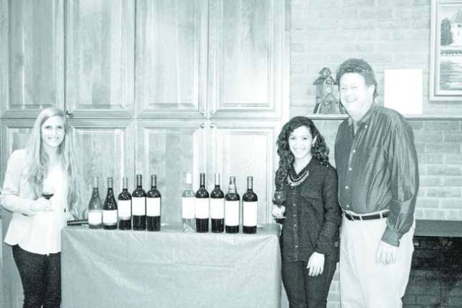 Library holds wine tasting Mariajose Feuereisen, Noelia Marchetti and Randy Burke.