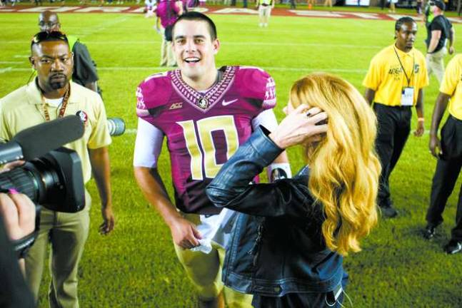 Sparta native Sean Maguire flashes a big smile after leading the #1 ranked Florida State Seminoles to a 23-17 overtime victory against Clemson Saturday night. Maguire started the game in place of suspended Heisman-trophy winner Jameis Winston. photos provided by the florida state university athletics department