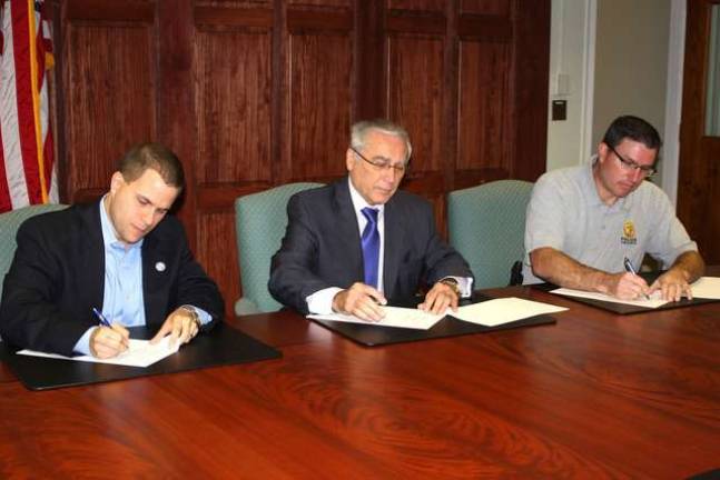 College, police sign into agreement College, police sign into agreement