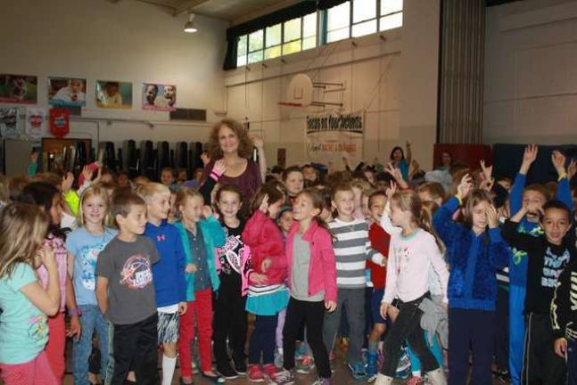Author visits with Alpine Elementary students Nancy Krulik with second graders at Alpine Elementary School. photos by rose sgarlato