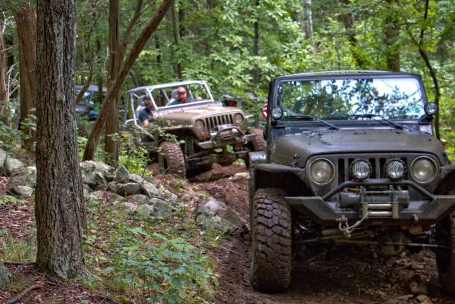 Wheelers for the Wounded trail ride Into the woods