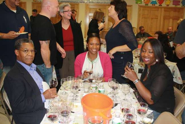 Library holds wine tasting Glenn Knight, Sommer Eudoxe and Janelle Daly. photos by rose sgarlato