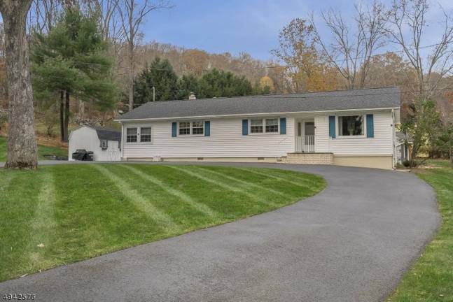 Bright and airy ranch features natural light, hardwood floors Bright and airy ranch features natural light, hardwood floors